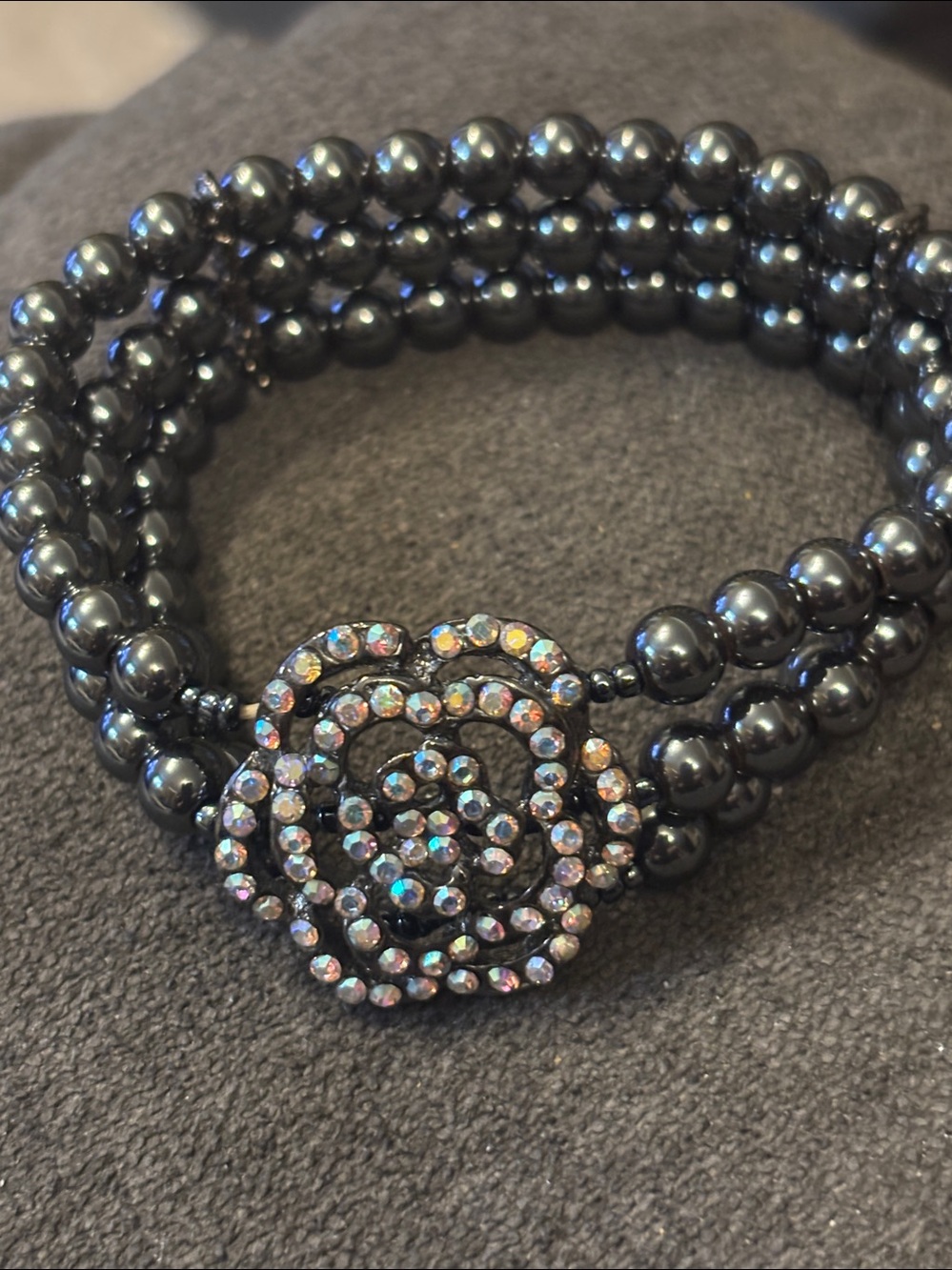 Black Grey metallic bead bracelet with an eye caching aurora borealis flower